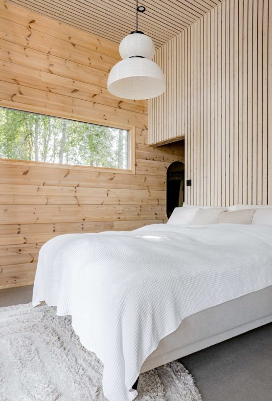A spacious Honka log house by the lakeside for a family – home to Outi, Heikki and their children